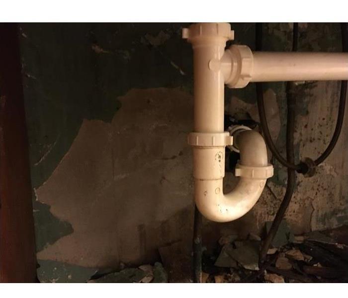 pipe, water damage, inside cabinet